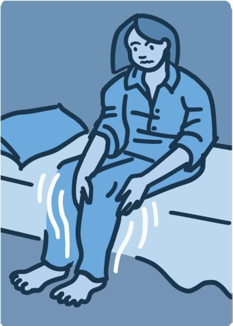 Ilustración de una mujer sentada en el borde de su cama con las piernas inquietas